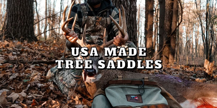 a man holding a buck with his USA Made Hunting Saddle On Display