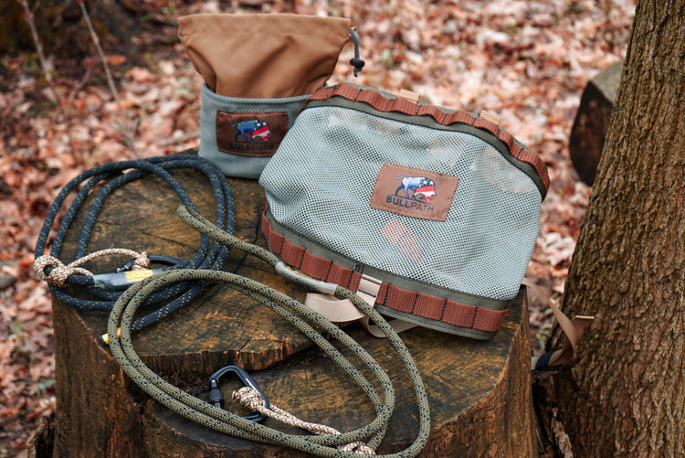 Hunting Saddle Kit on Display on a Tree Stump