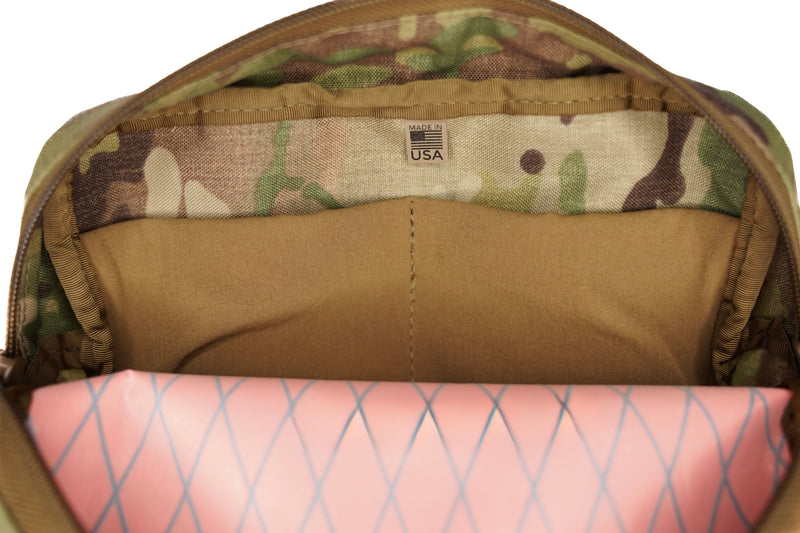Load image into Gallery viewer, Close-up of a camouflage bag with 2 stretch pocket compartments, featuring a USA label.
