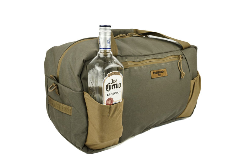 Load image into Gallery viewer, BullPath Duffel bag with a bottle of Jose Cuervo on a white background
